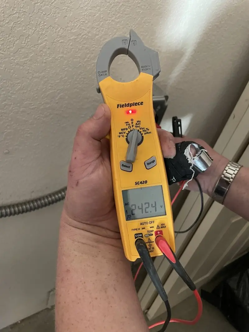 Voltage testing with clamp meter during Electrical Installation Services in Nyack